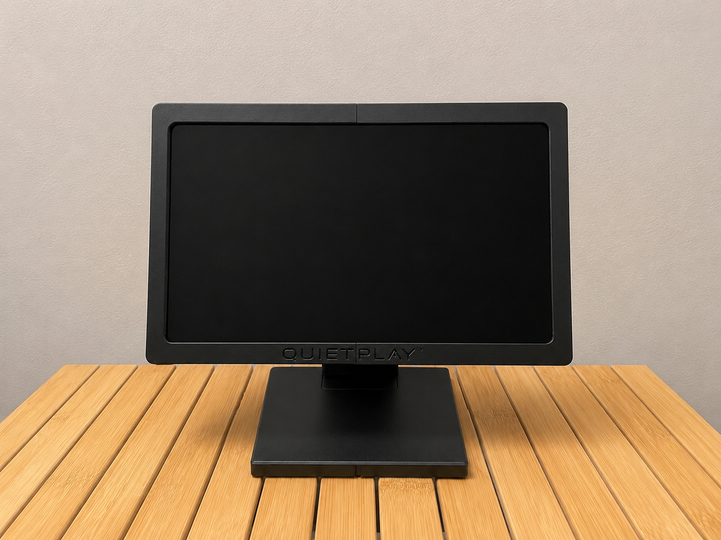 QuietPlay touchscreen device on its stand